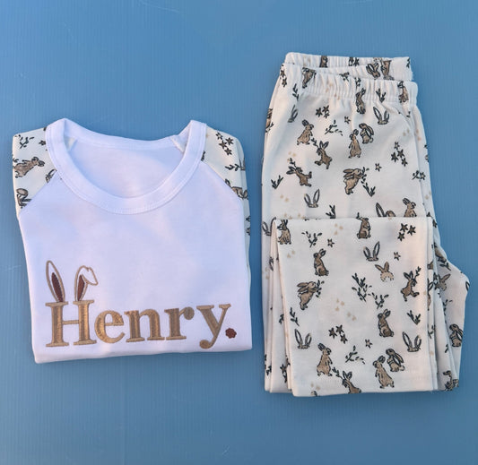 Rabbit printed pyjamas with child’s name Henry embroidered with bunny ears on the H