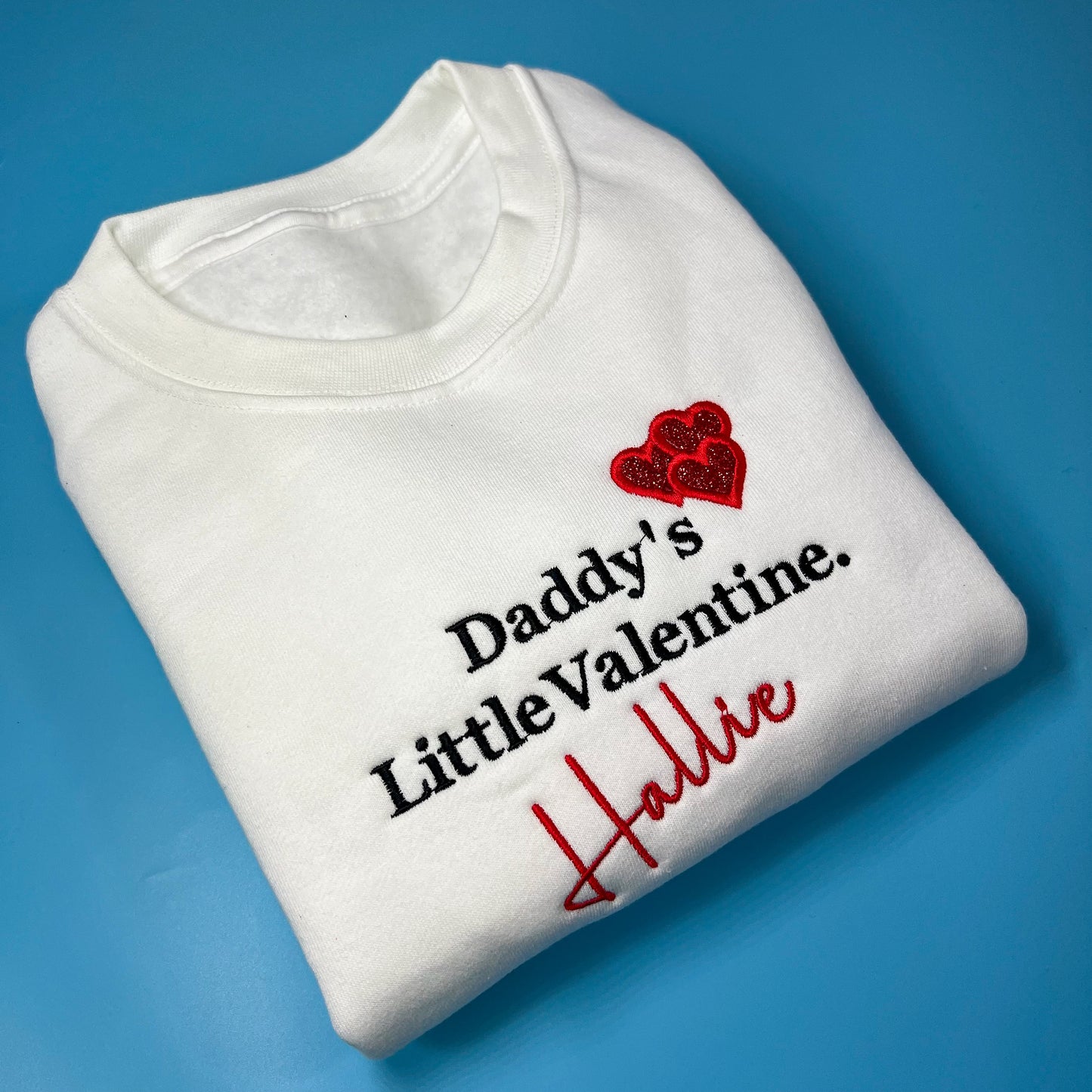 White jumper with ‘daddy’s little Valentine’ embroidery with glitter heart