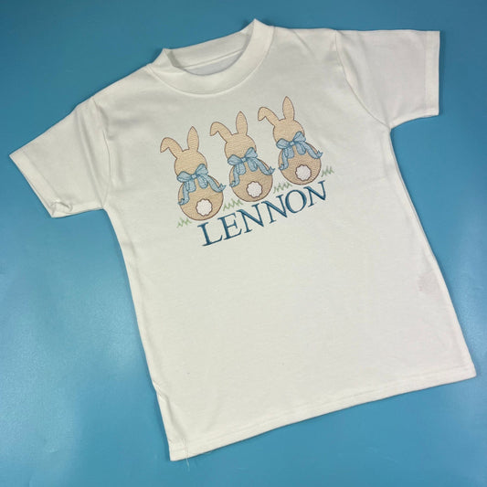 White tshirt with 3 bunnies embroidered with name 