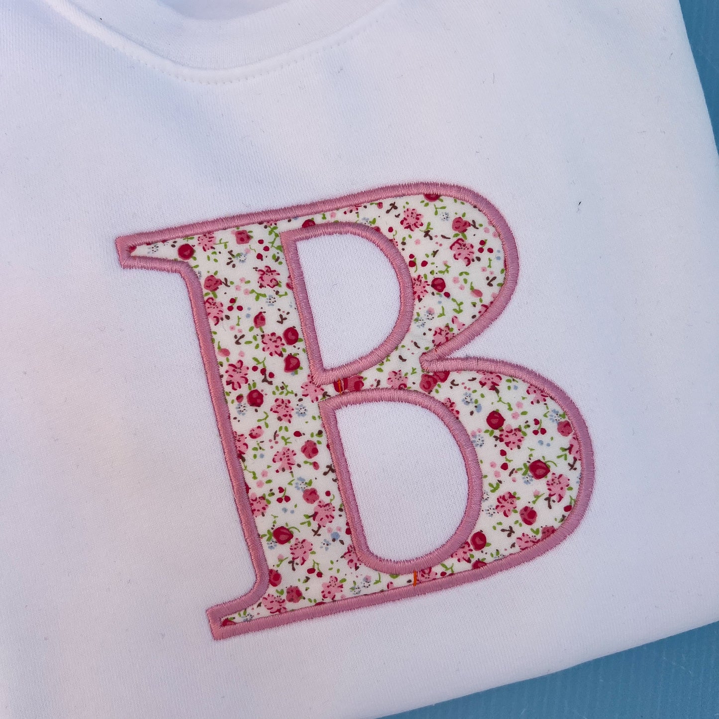 Floral inital sweatshirt