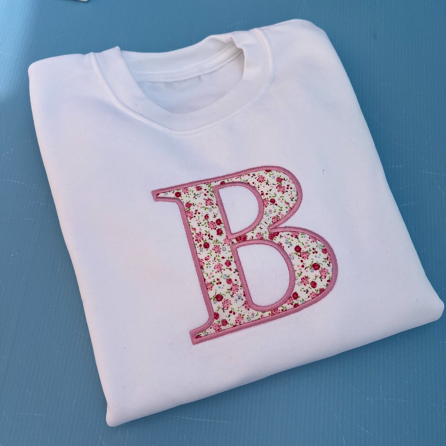 Floral inital sweatshirt