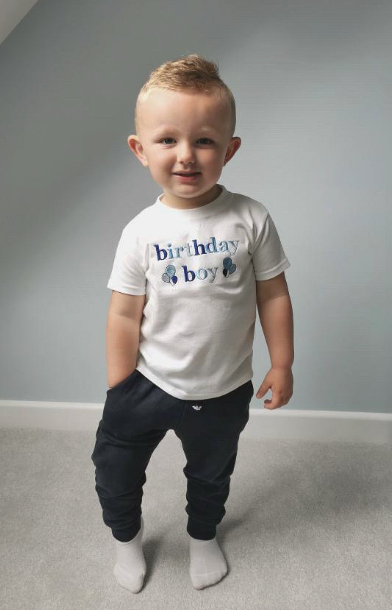 Boys wearing a birthday boy T-shirt