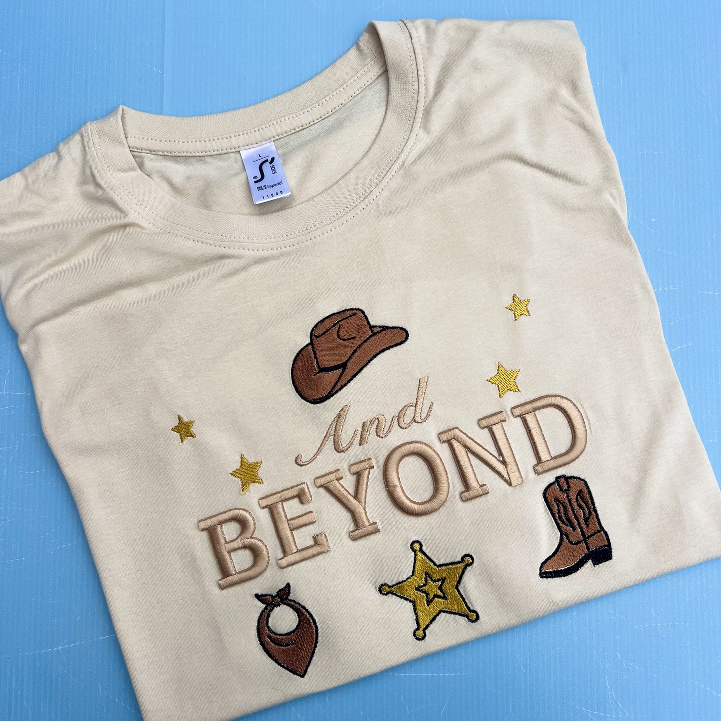 And Beyond Tee