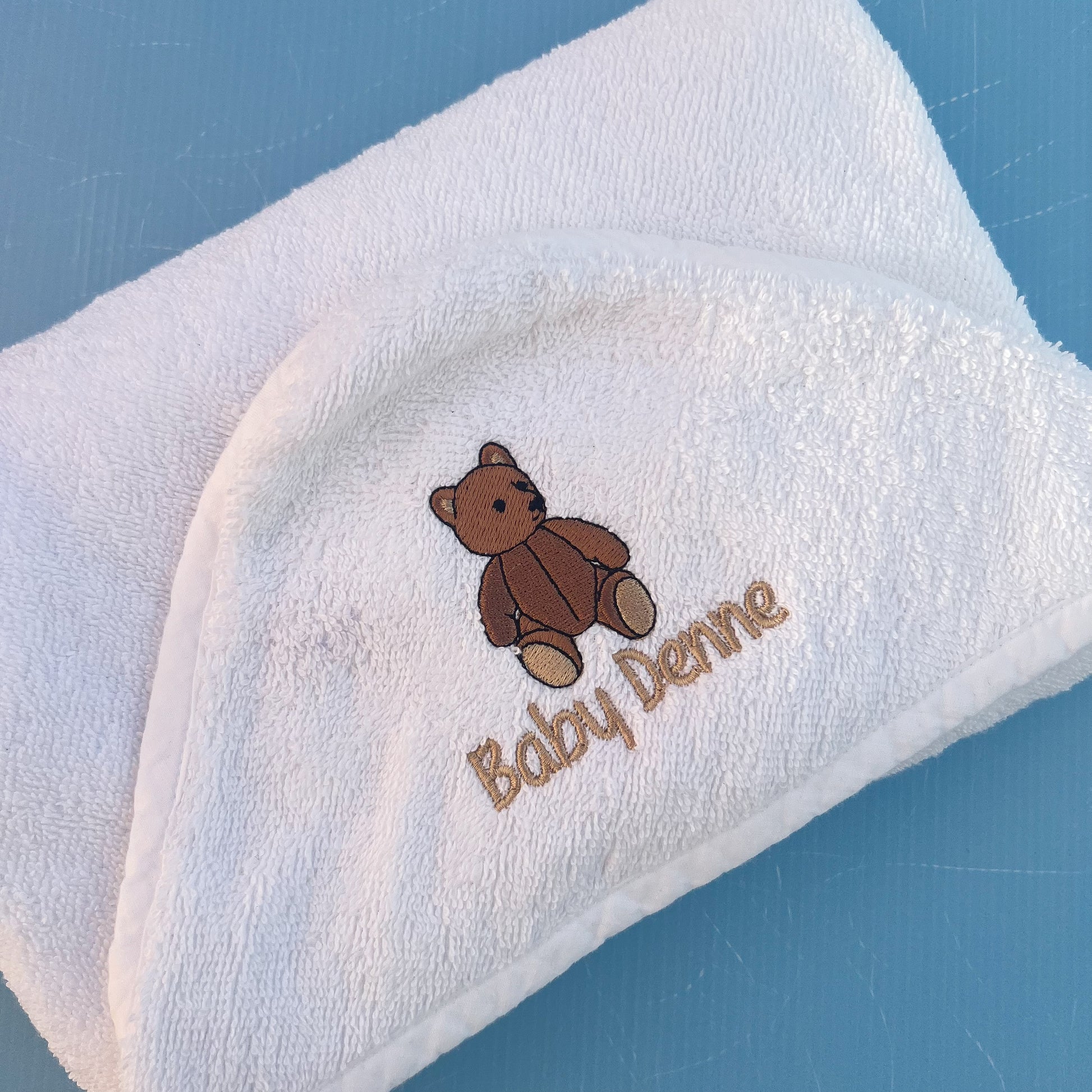 Baby towel with traditional bear embroidery 