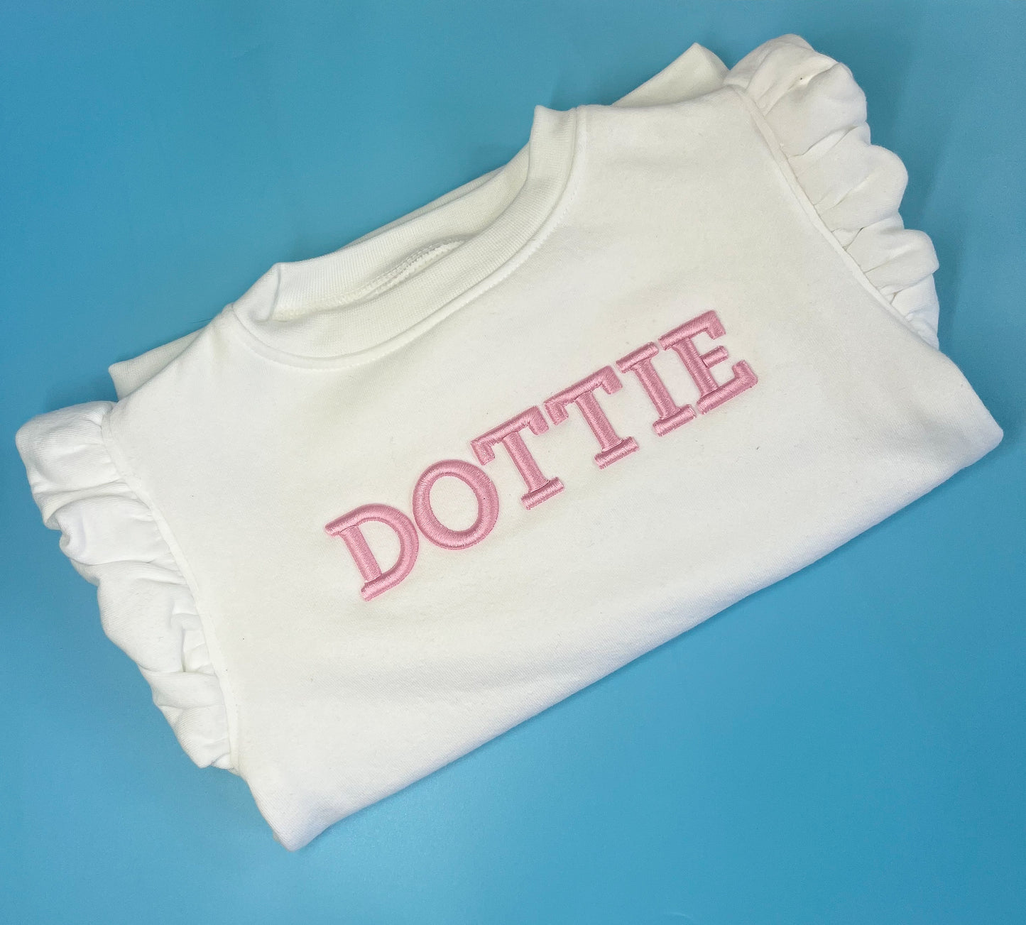 White Frill Jumper with Pink 3D Font Jumper